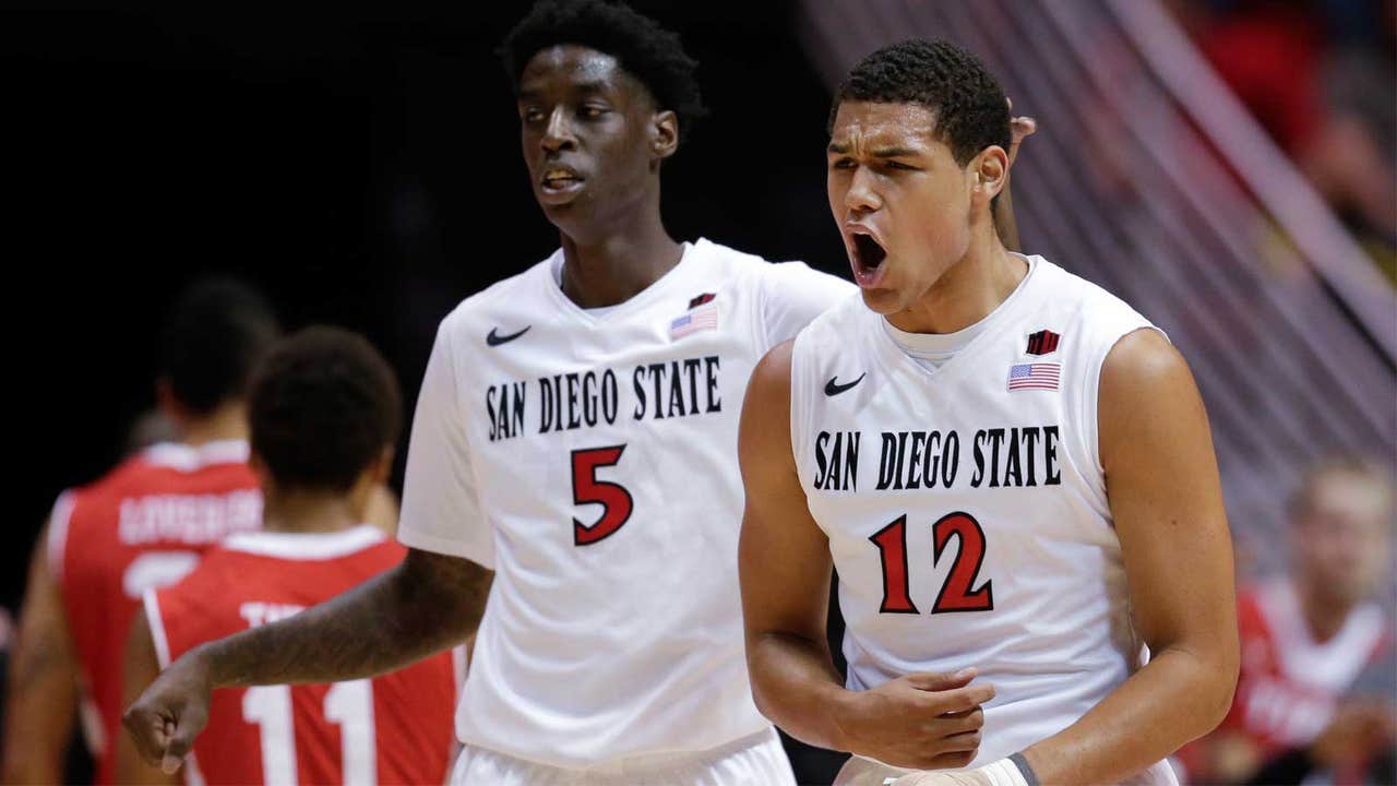 O'Brien leads No. 16 SDSU over No. 25 Utah, 53-49